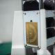 Focused Picture of Qosmosys Gold-Engraved Plate